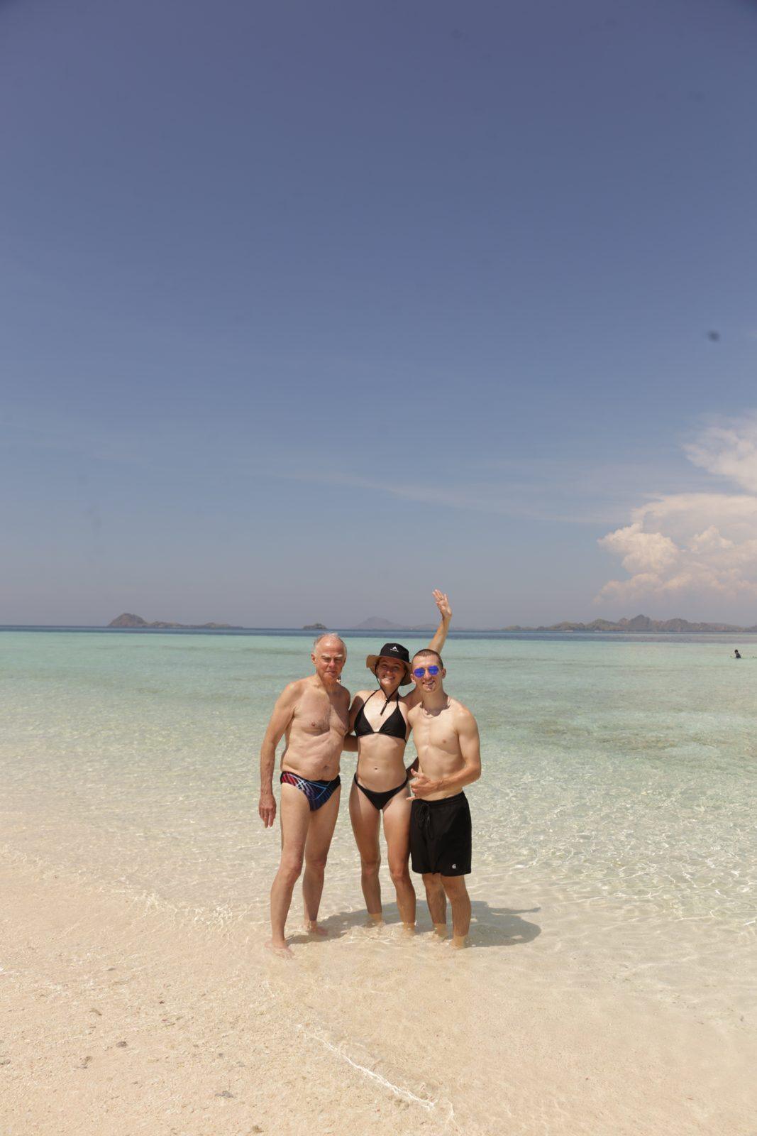 Taka Makassar – group on sandbar, arms raised (Real photo from a KEXI trip)